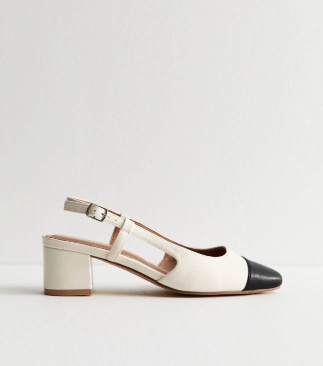 Single white shoe with black toe